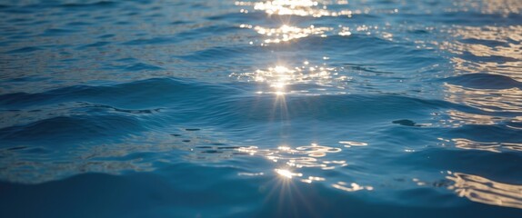 Wall Mural - radiant blue water surface capturing sun reflections with ample space for text overlay