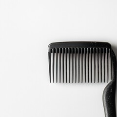 Fototapete - Close up view of a black comb resting on a clean surface with strands of hair for styling and grooming purposes. Generative AI