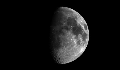 Wall Mural - Beautiful moon in one of its phases on a black background