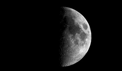 Wall Mural - Beautiful moon in one of its phases on a black background