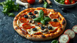 © Farhan - Delicious pepperoni pizza with mushrooms and olives on a dark background. pepperoni pizza top view. Perfect Italian pizza with copy space for menu design and promotions.