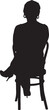 © curto - vector; silhouette of a rear view of a woman sitting on chair, legs crossed