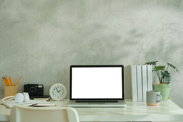 Wall Mural - stylish and clean home office workspace featuring a laptop, stationery.