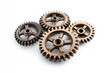 © idharmaian - Bronze gears meshing, studio shot, white background, teamwork concept