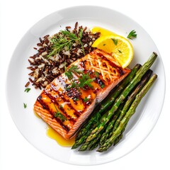 Wall Mural - Grilled Salmon Fillet on a Plate Served with Wild Rice, Asparagus, and Lemon Wedge Garnished with Fresh Herbs