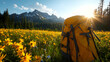 © Arthur Constantine - Yellow Backpack in a Wildflower Meadow with Mountain Views