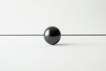 Wall Mural - A dark sphere rests on a thin straight horizontal line