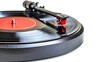 © Biggy - Vintage Turntable Playing a Classic Vinyl Record with Red Label
