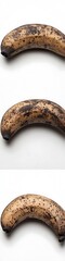 Wall Mural - Ripe, speckled banana resting on a clean surface, showcasing its texture and color variations