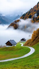 Scenic landscape featuring two quaint houses on a winding path, surrounded by misty mountains and vibrant autumn foliage.