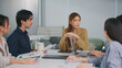 © Leny Studio - Marketing woman leader team brainstorming creative strategy analysis business growth sharing ideas collaboration for corporate success developing advertising campaigns discussing digital marketing
