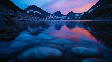 Canvas Print - Mystical mountain lake reflecting the twilight sky in serene panorama