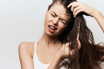 woman, hair care, frustration, white background, beauty routine, beauty discomfort, lifestyle, fashi