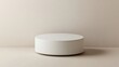 © Abdul - Blank White Cylinder Display Stand on Beige Background