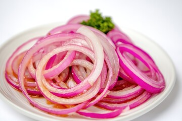 Poster - A close-up of a white plate topped with sliced red onions, perfect for food photography or recipe illustrations