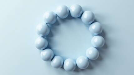 Poster - Pastel Blue Spheres Forming a Circular Frame on a Light Blue Background, Perfect for Minimalist Designs and Presentations