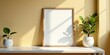 © parichart - A blank frame with potted plants rests on a minimalist shelf bathed in sunlight