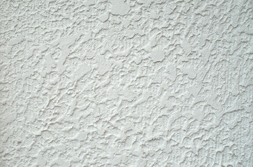 Wall Mural - White rough plaster on wall closeup