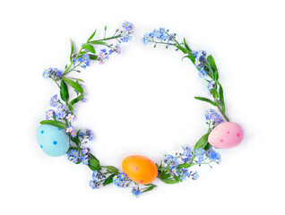Wall Mural - easter decoration. blue flowers forget-me-nots, easter painted eggs on a white background with space