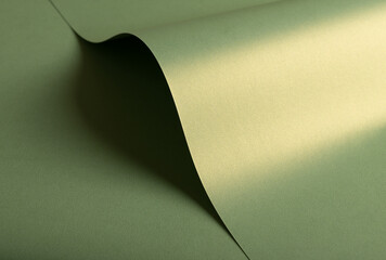 Aufkleber - Pastel olive green paper background with a pearlescent, glossy texture and shimmering wavy edges. Soft sage and moss tones create a refined, elegant, and organic abstract design.