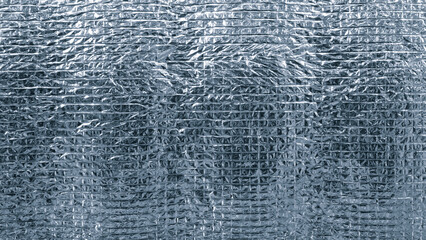 Poster - A blue and silver foil with a pattern of squares. The foil is shiny and reflective. The image has a metallic and futuristic feel to it