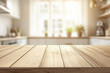 © Sitthikorn - Empty wooden table with the bright interior of kitchen, blurred background, bokeh golden sunshin.