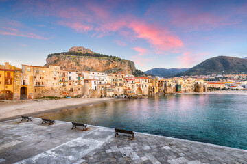 Wall Mural - Fantastic evening cityscape of Cefalu city. Popular travel destination of Mediterranean sea.