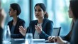 © LU - Indian HR director leading a leadership meeting with senior management