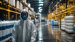 © Юлия Сергеева - Worker in protective gear inside a chemical storage facility during the daytime shift observing safety protocols in action