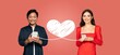 © Prostock-studio - A couple celebrates Valentine's Day by exchanging affectionate messages on their smartphones. They smile while connected through a heart symbol, showcasing modern love in a happy moment.