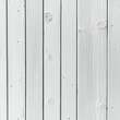 © Onn Tara - A collection of vertical wooden planks painted in white, showcasing a smooth finish