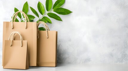 Poster - Eco Friendly Shopping Bags with Green Leaves on White Background Sustainable Retail Concept