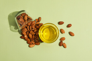 Wall Mural - Skin care and body care concept - almonds, almond oil