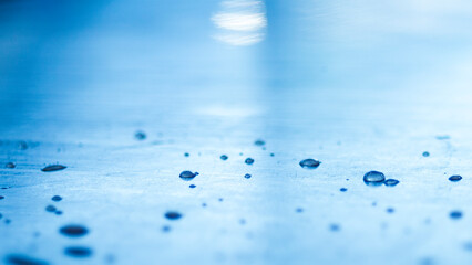 Wall Mural -  Water drops on blue background