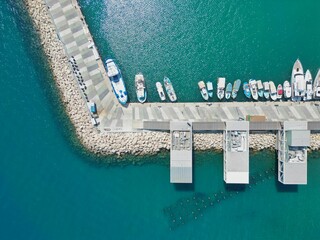 Canvas Print - Aerial view of marina with docked boats.