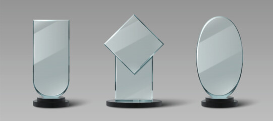 Wall Mural - glass trophy set with different shapes - rectangle, diamond, oval mounted on black bases. transparen