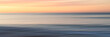 © Westend61 - Abstract seascape at dawn in Menton, C�te d'Azur, France with blurred water and sky.