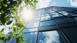© Generative AI - Stunning view of a modern glass building reaching towards the bright blue sky with lush green leaves in the foreground : Generative AI