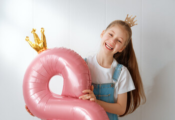 Wall Mural - Child with pink air balloon.