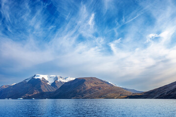 Wall Mural - beautiful and tranquil landscape of northeast greenland national park in summer. snow covered mounta
