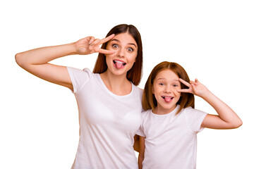 Wall Mural - Portrait of two nice attractive lovely comic crazy childish cheerful cheery glad positive person showing v-sign having fun fooling isolated over bright vivid shine yellow background