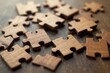 © Temteen - Fragmented wooden puzzle with scattered pieces, unfinished puzzle pieces, disjointed shape, puzzle broken