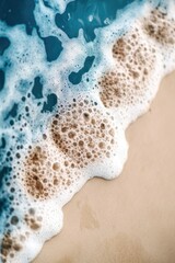 Wall Mural - Close-up shot of a wave crashing on the beach, great for travel and vacation themes