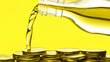 © HiSea - Pouring olive oil over stacked coins business investment concept in yellow background still life photography