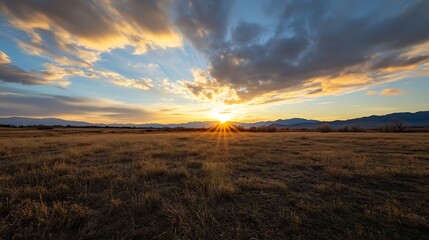 Aufkleber - Golden Sunset Over Grassy Field with Majestic Cloudy Sky : Generative AI