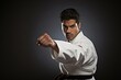 © Rawpixel.com - South asian man karate clothing apparel.