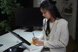 © phonix_a - Asian teenage businesswoman in private office.