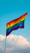 © Yusuf - rainbow flag waving on the sky, web banner, pop art. White tone