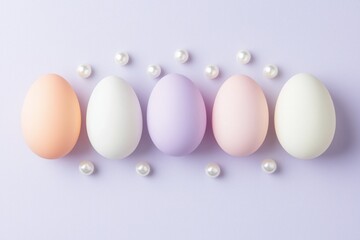 Wall Mural - five pastel colored easter eggs arranged in a horizontal row on a purple background, adorned with pe