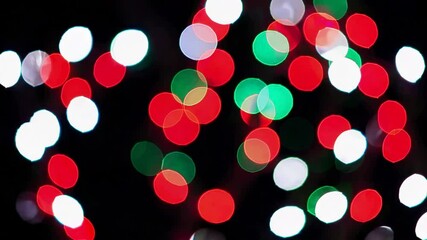 Aufkleber - Colorful bokeh lights with red, green, and white circles, festive holiday ambiance. Abstract background and celebration concept